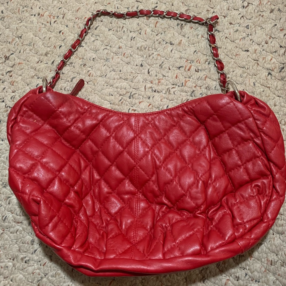 Red purse with chain link strap